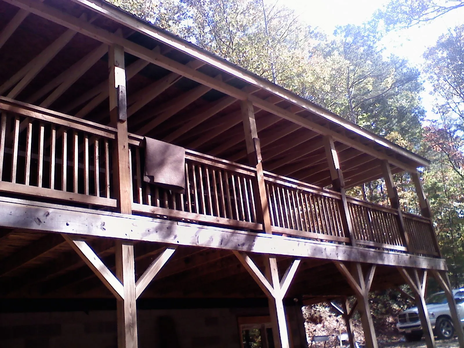 Timber framing under a new elevated porch and deck — Roof Leak Repair in Kansas City by Roofing Brothers
